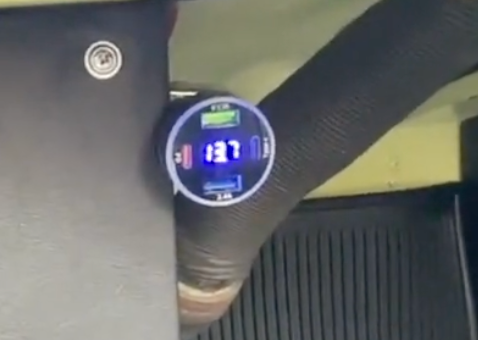 Plug-in USB adapter with voltmeter